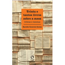 Trinta e tantos livros sobre a mesa Trinta e tantos livros sobre a mesa